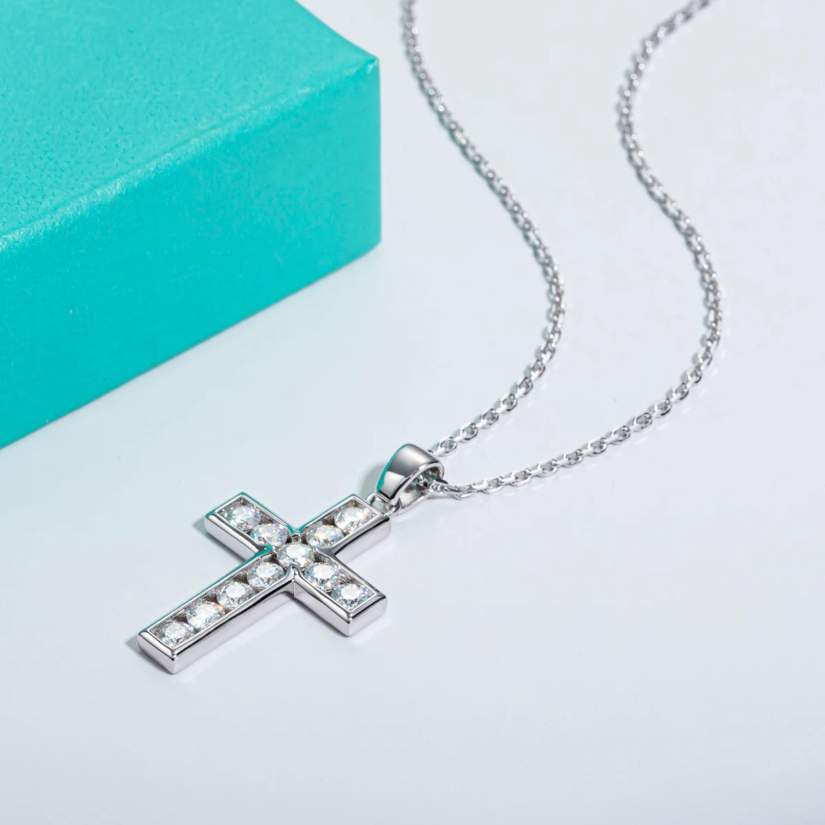 Encompassed Moissanite Cross Pendant - Sterling Silver